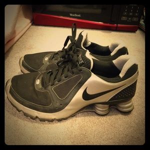 Black and silver Nikes